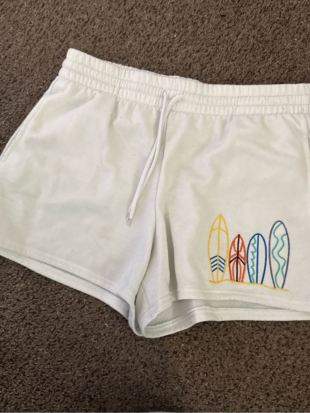 White Women's Athletic Shorts with Surfboard Embroidery
